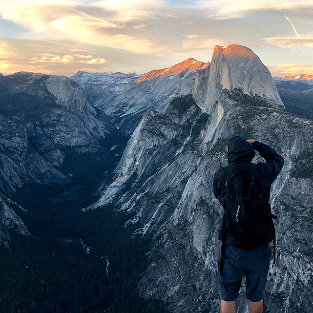 Image of artist photographing Half Dome in Yosemite National Park.
