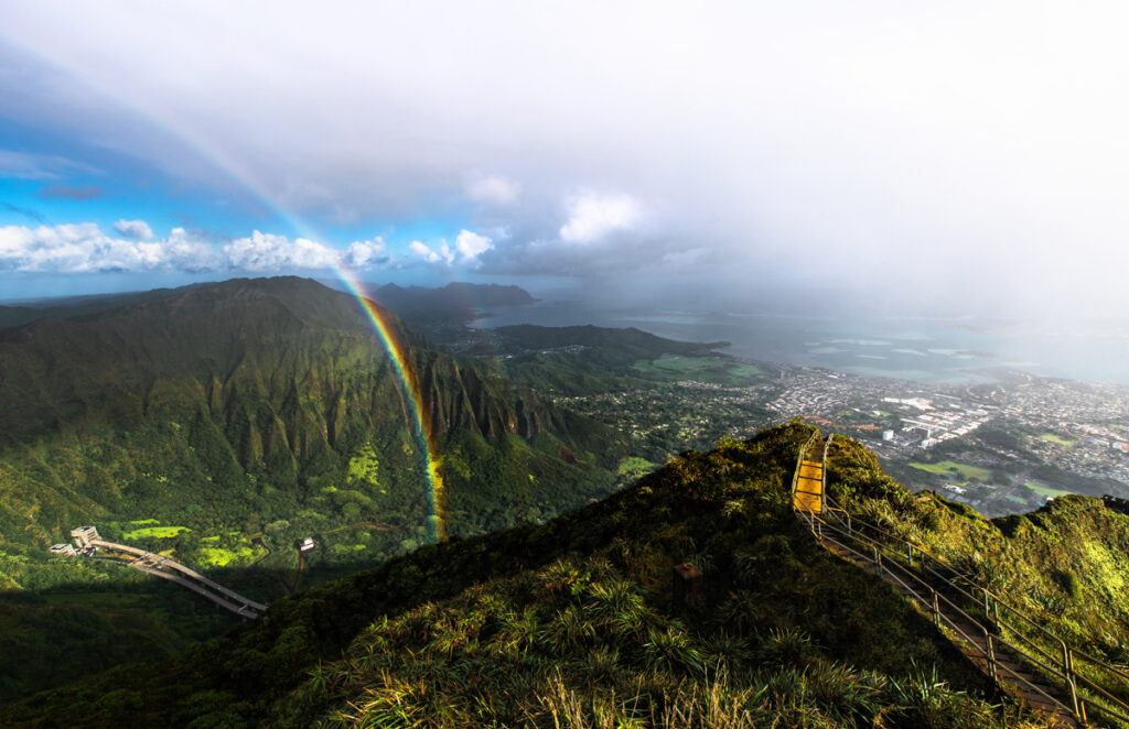 A double rainbow viewed from the top of Haiku Stairs in Hawaii